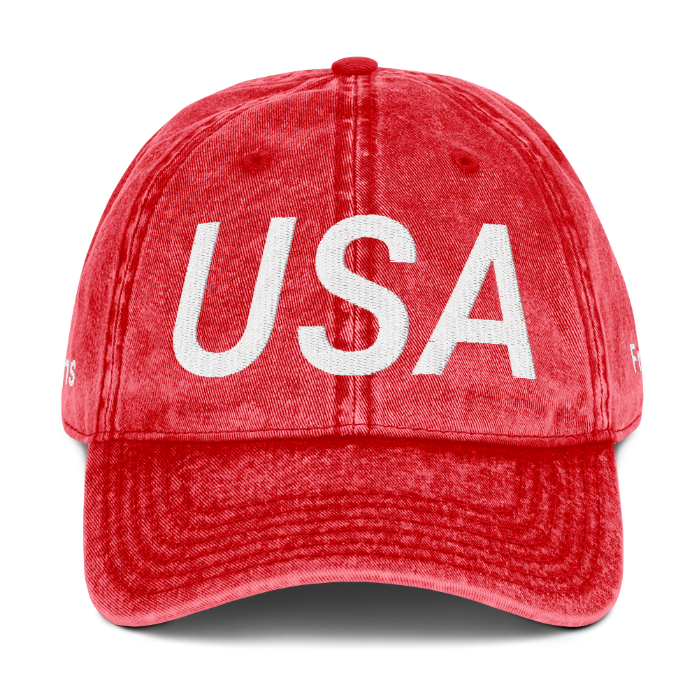 Red cap with 'USA' printed on it against a white background