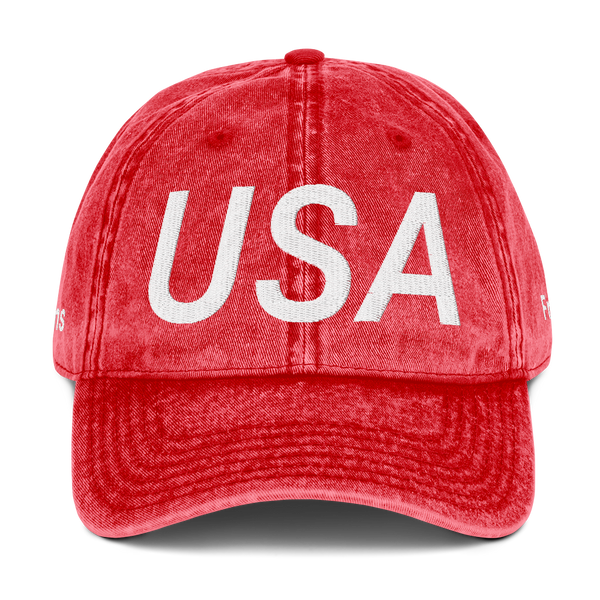 Red cap with 'USA' printed on it against a white background
