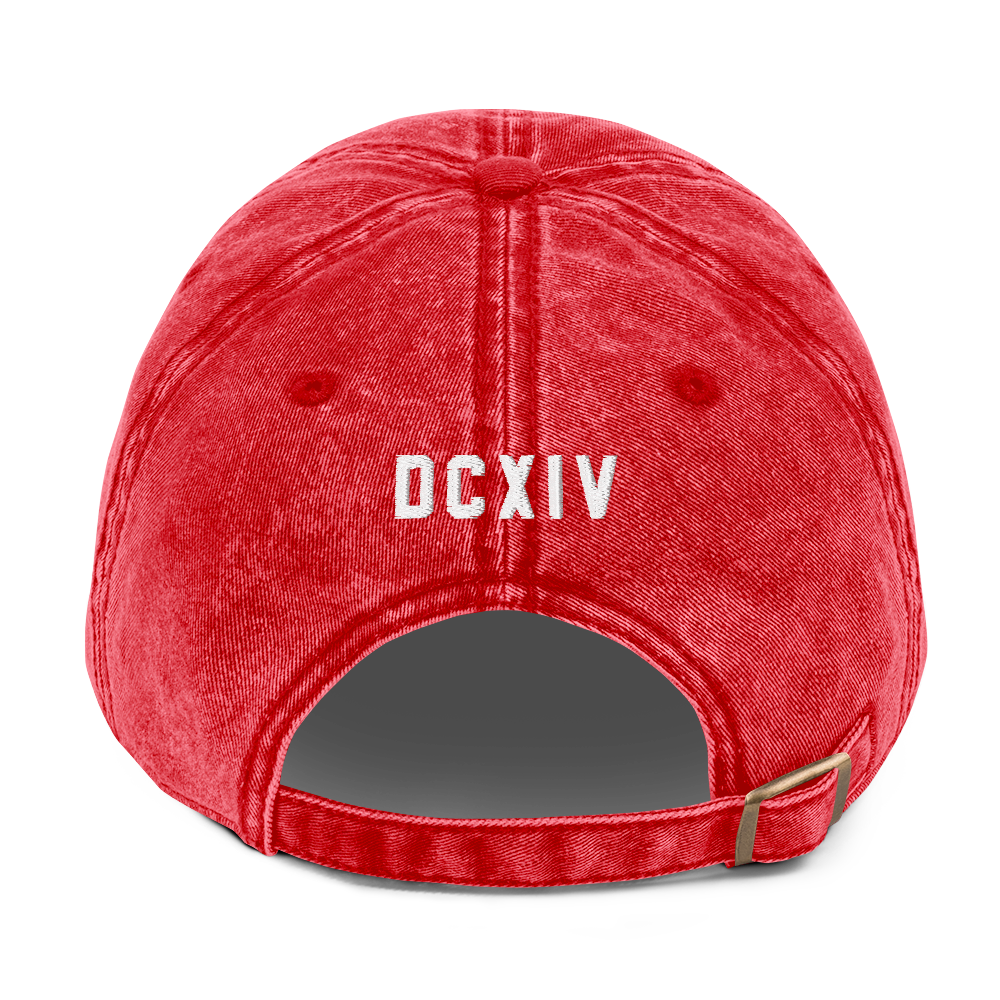 Red cap with 'DCXIV' logo on a white background