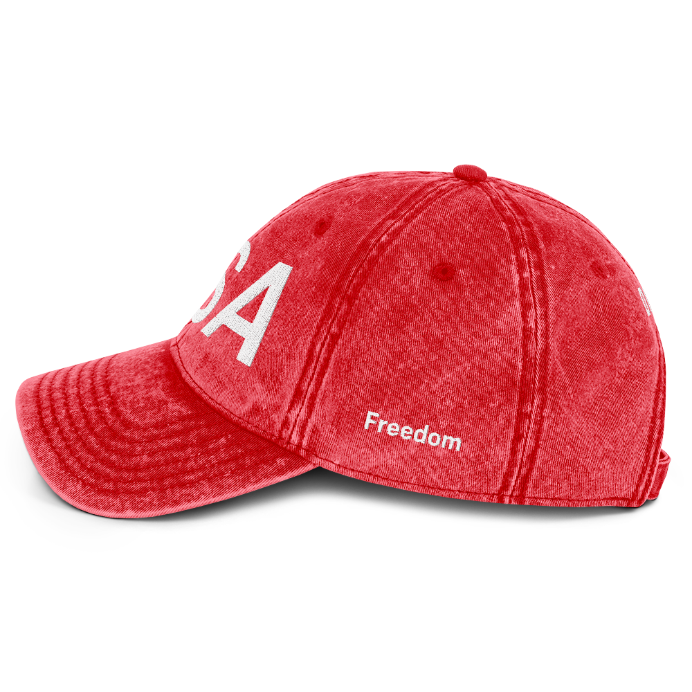 Red cap with 'USA' printed on it against a white background